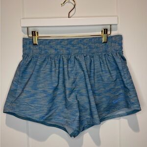 Nike Women's One Dri-FIT Mid-Rise 3" Brief-Lined Shorts in a blue space-dye M